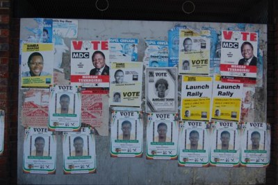 Election posters for opposition candidates Simba Makoni and Morgan Tsvangirai.