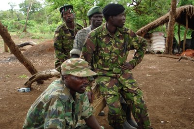 Some of the LRA soldiers sit outside, Sudan, April 2007.
