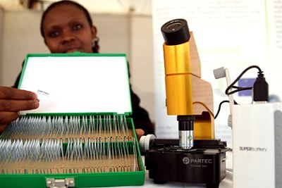 A newly-developed microscope, complete with ready-to-use malaria test slides, on display at the malaria conference in Nairobi.