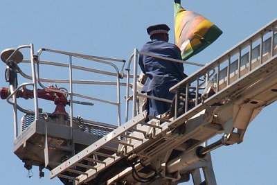 Untangling the Zimbabwe flag.