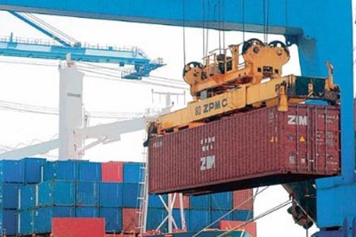 A container is offloaded from a ship at Mombasa port.