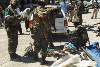Peacekeepers checking through weapons handed in by Somali businessmen (file photo).