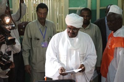 Sudanese President Omar Al Bashir voting (file photo).
