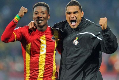Asamoah Gyan, left, and Kevin Prince Boateng of Ghana celebrate their team's win.