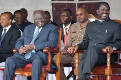 President Mwai Kibaki (left) and Prime Minister Raila Odinga (right).