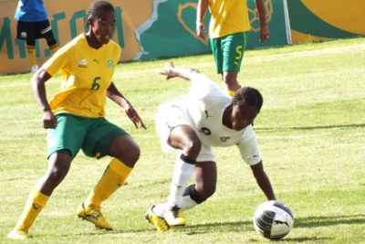 South Africa's Under-20 women's team, known as Basetsana, in yellow and green, battle Ghana.