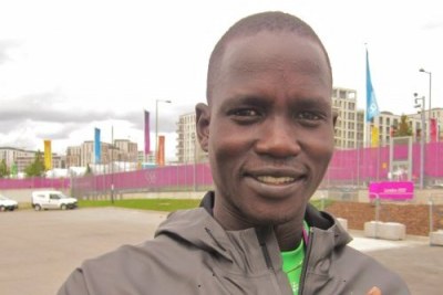 Guor Marial outside the Olympic Village in London the day after running in the London 2012 marathon