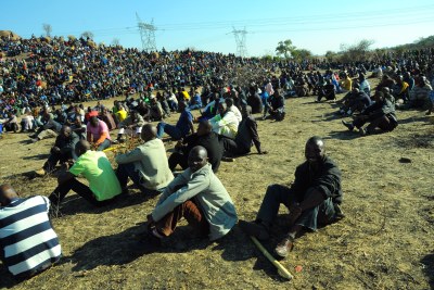 Striking Lonmin miners gather on a hill near the Marikana mine before the shooting in 2012 (file photo).