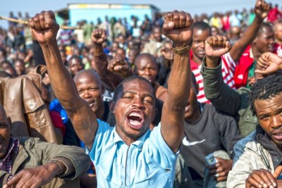 Striking Lonmin miners gathered to have a meeting to discuss the deaths of some 34 of their colleagues two days previously.