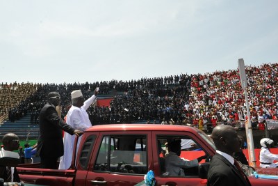 President Ernest Bai Koroma waves to thousands of supporters.