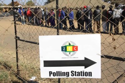 Voters queuing to cast their ballots.