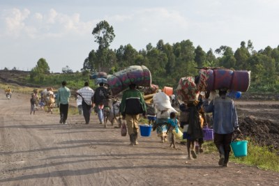 Nigerians fleeing (file photo).