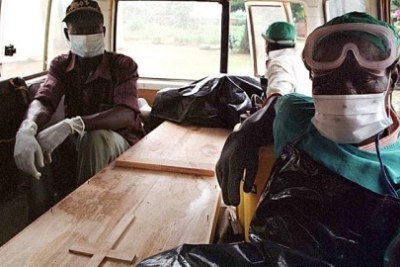 Battling the deadly virus in neighboring Guinea.