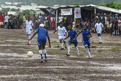 Ruth the captain (3rd from left) in action with her team at the PTP refugee camp, Grand Gedeh County, Liberia.