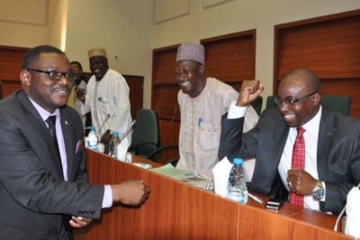 Ebola Virus in Nigeria: From left, Minister of Health, Oyebuchi Chukwu greeting Honorable Members from afar to avoid contact of Ebola Virus during Public Hearing on Ebola Virus at National Abuja