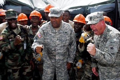 U.S. troops collaborate with Armed Forces of Liberia engineers to build Ebola treatment centers (file photo).