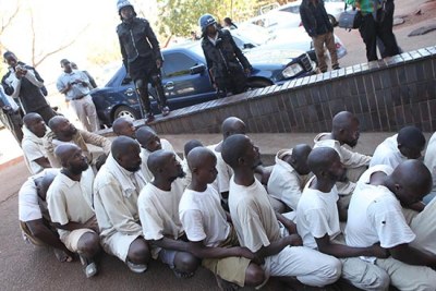 Members of the Apostolic church accused of beating police officers.