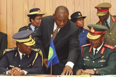 Lesotho security chiefs signing an electoral pledge ahead of the February 2015 polls. The security forces remain unreformed and riven by factional disputes.
