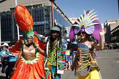 South Africans show off their outfits which stole the show at the inaugural Zimbabwe International Carnival held in Harare on May 25, 2013.