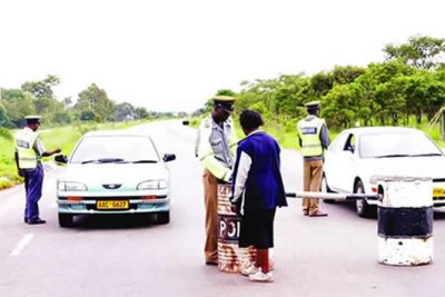 Police traffic roadblock in Zimbabwe.