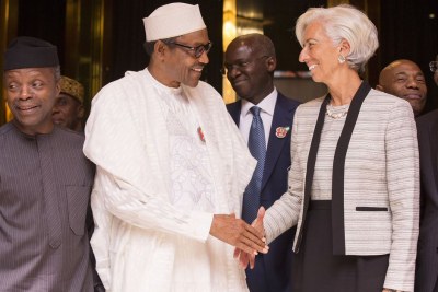 Nigerian President Muhammadu Buhari, along with Vice President Yemi Osinbajo  greeting IMF Managing Director Christine Lagarde