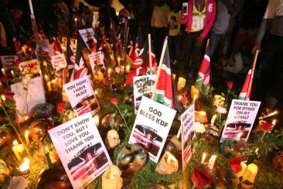 Kenyans lit candles at Freedom Corner, Uhuru Park, on January 21, 2016, during a vigil in honour of KDF soldiers who were killed when Al-Shabaab militia attacked a camp in Somalia.