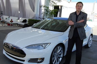 Tesla founder Elon Musk standing in front of a Model S (file photo).