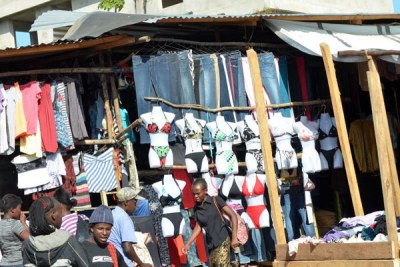 Second hand 'Mitumba' clothes on display at an open stall at a Kenyan market.