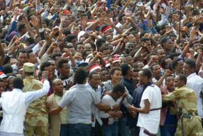 Ethiopian religious festival-goers in a defiant stance that allegedly saw police respond with teargas and rubber bullets.