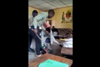 Mbeya day secondary school teachers assaulting a student.