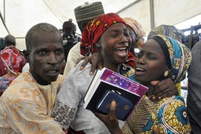 Released Chibok girls reunite with families.