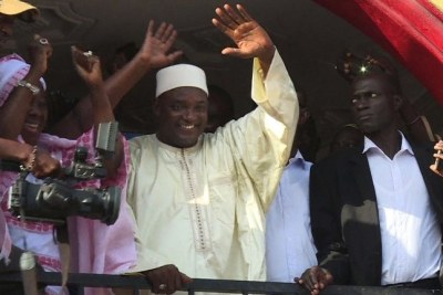 Gambia’s President-elect Adama Barrow (C) gesturing to the crowd in Kololi.
