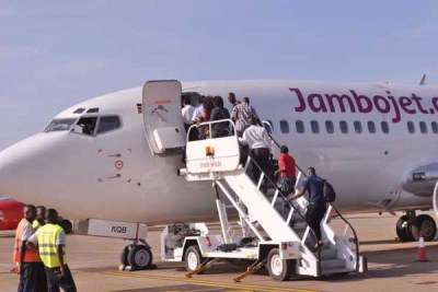 Passengers board a Jambojet aircraft (file photo)
