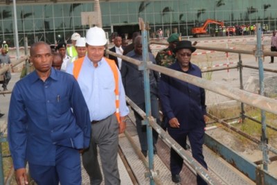 President John Magufuli inspects construction works at Terminal III of the Julius Nyerere International Airport (JNIA) during his impromptu visit to the site in Dar es Salaam.