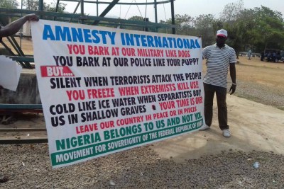 The protesters demanded immediate vacation of Nigeria by Amnesty International.