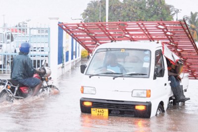 A Dar es Salaam street flooded after a heavy downpour. Population growth and effects of climate change have made the East African fastest growing city prone to floods.
