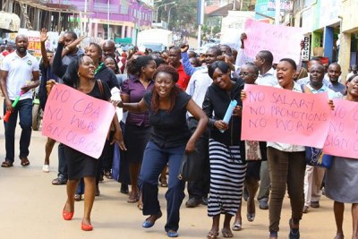 Nurses demonstrate in the streets of Kisii over the failure by the national and county governments to honour their collective bargaining agreement.