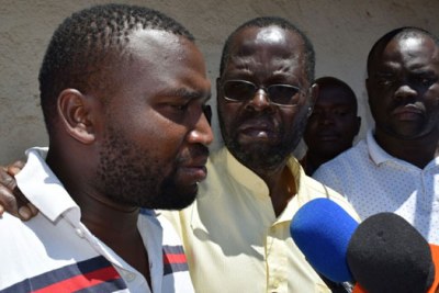 Samantha Pendo's father, Joseph Abanja, is consoled by Kisumu Governor-elect Anyang’ Nyong’o.