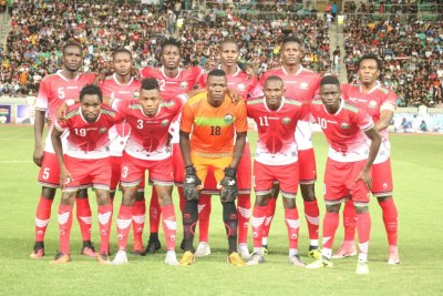 Harambee Stars players line up before a past friendly match against Iraq in Basra.