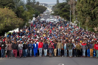 Hundreds march from the Hermanus Magistrates’ Court to Zwelihle after a bail hearing was postponed on Tuesday.
