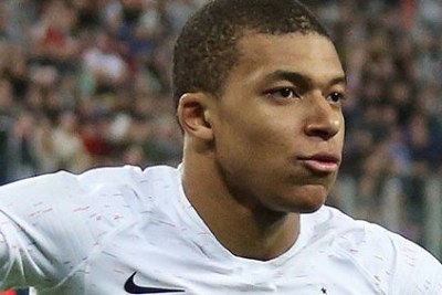 Kylian Mbappe celebrating scoring a goal for France in a pre-World Cup match in March 2018. His mother is from Algeria and his father from Cameroon.