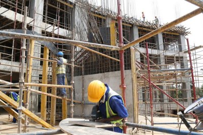 Workers at a construction site (file photo)