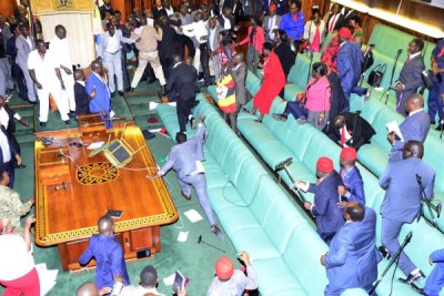 Members of Parliament fight in the Parliament chambers during the last constitutional amendment that sought to remove the presidential age limit in 2017.