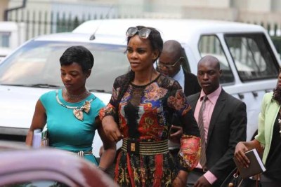 Mary Chiwenga, center, arrives at Harare Magistrate Court, in Harare, Zimbabwe, Dec. 16, 2019.