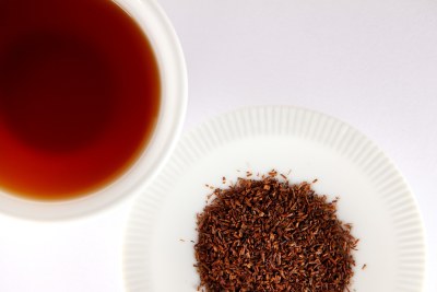 A cup of rooibos tea, with rooibos tea leaves (file photo).