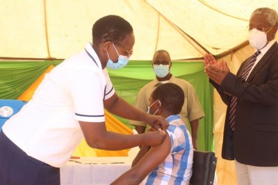 A health worker receives the jab at Marimanti Sub-County Hospital (file photo).